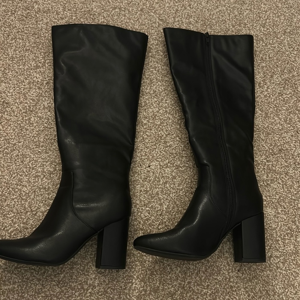 Tall black boot heels